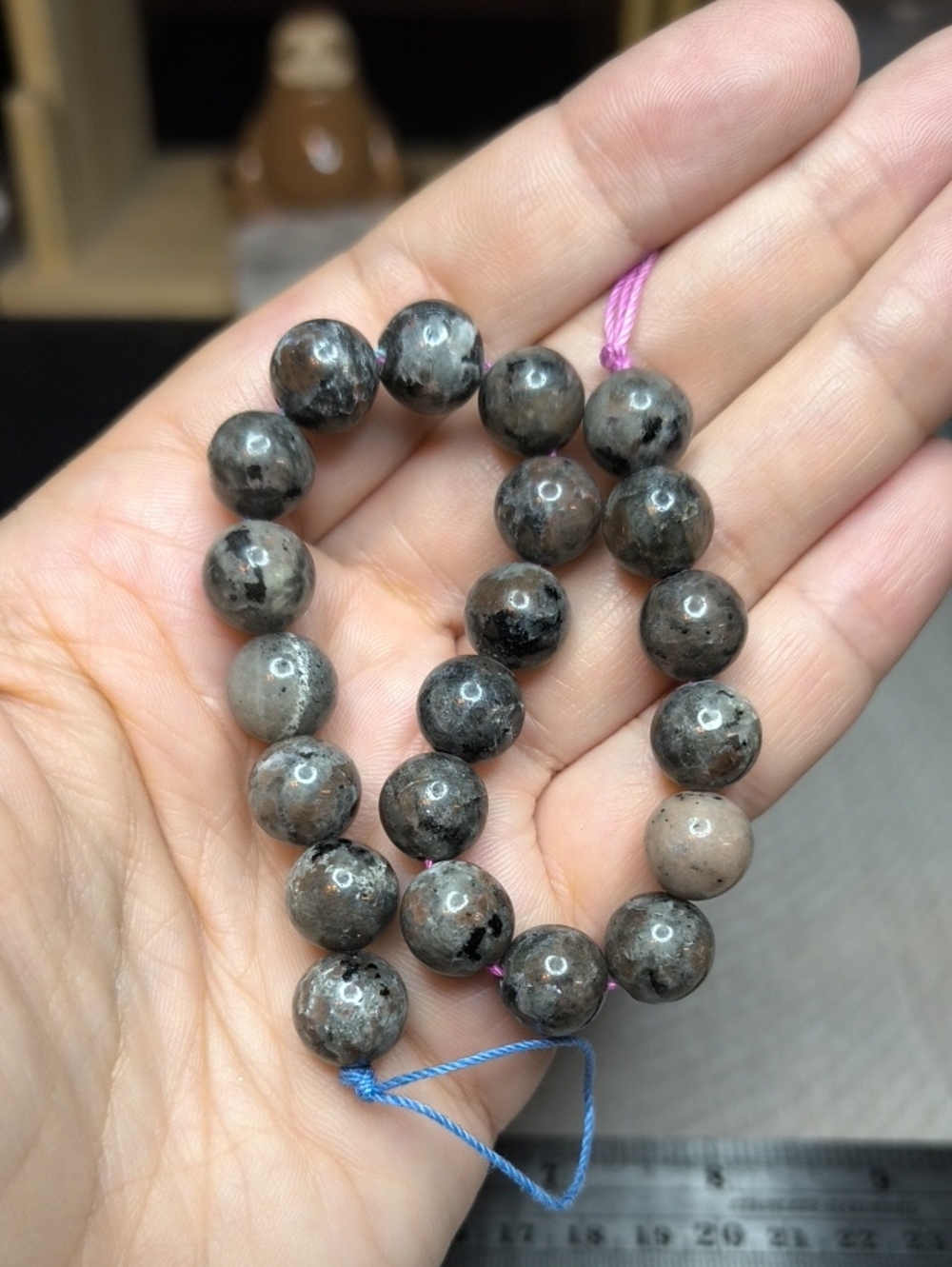 #1- 10mm Yooperlite (Fluorescent Sodalite-Syenite) 8-Inch Bead Strand